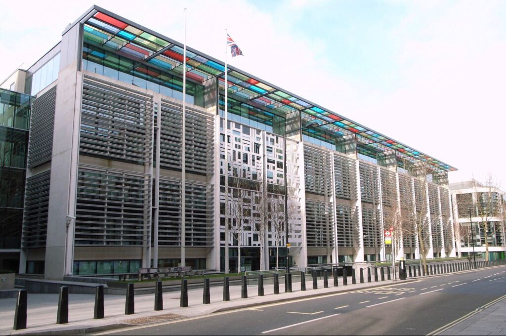 UK Parliament and government buildings representing immigration rule changes in 2026